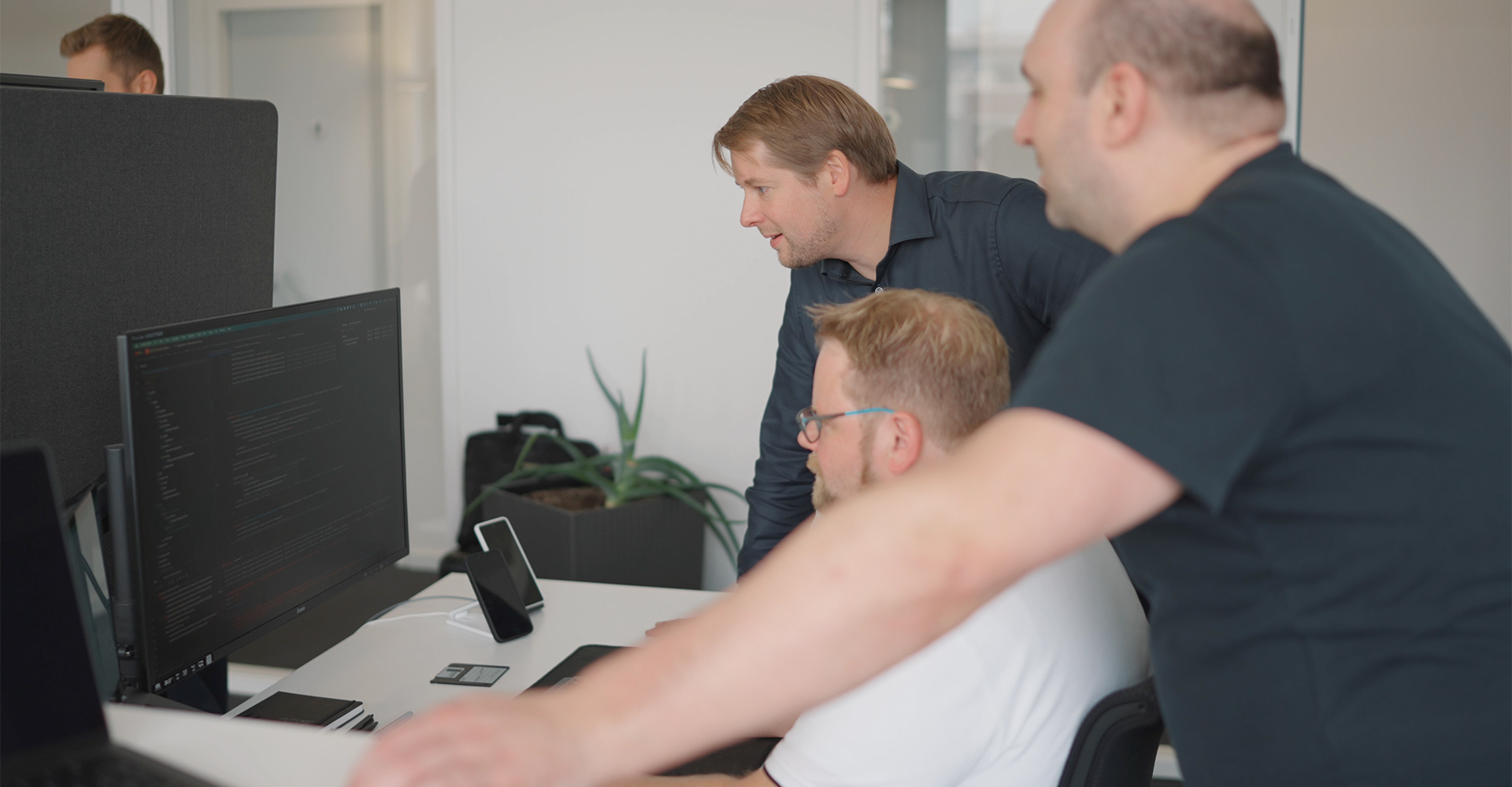 PEC Development Expert:innen bei der gemeinsamen Softwareentwicklung.